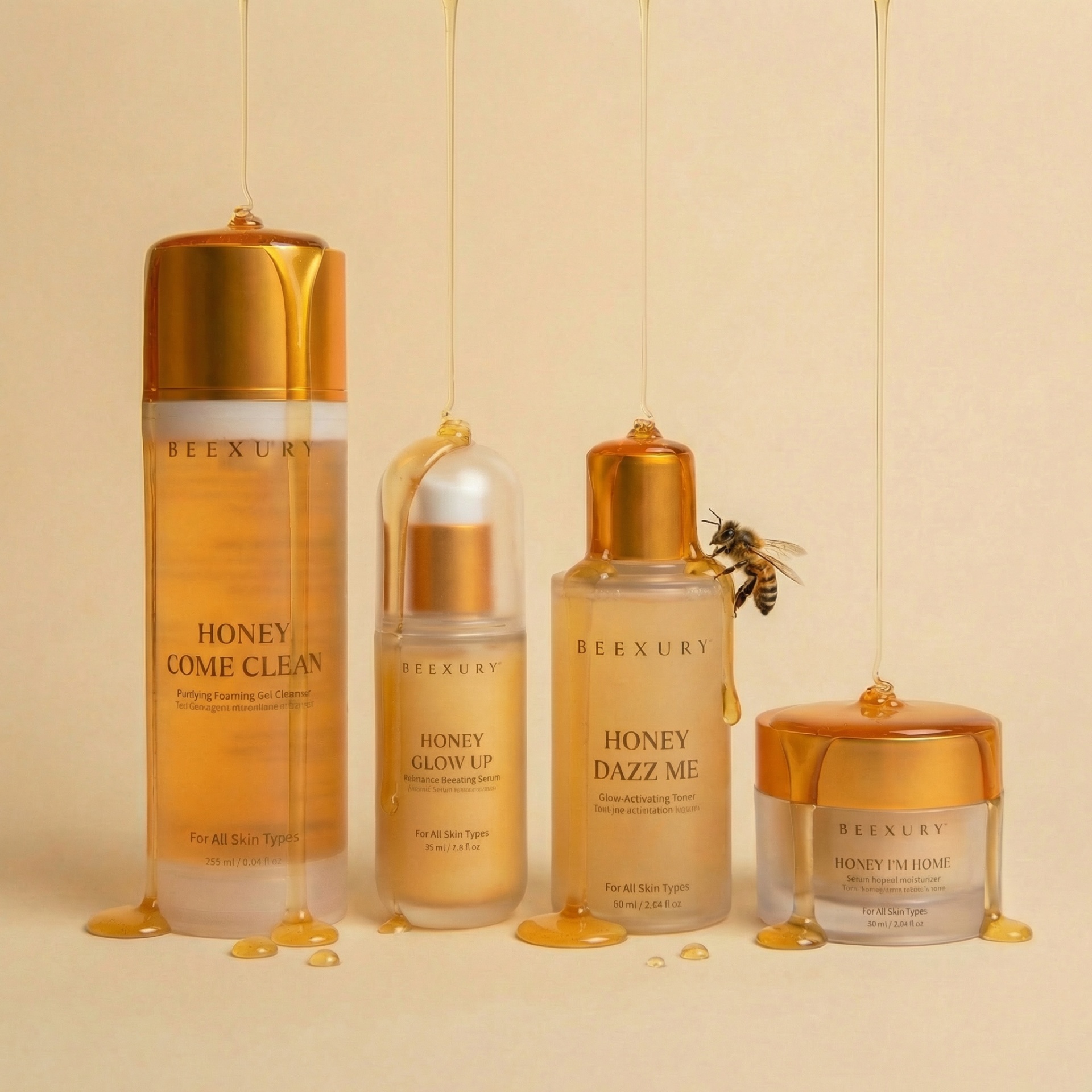 The four Beexury Glow System bottles with dripping honey — Honey Come Clean, Honey Dazz Me, Honey Glow Up, Honey I'm Home