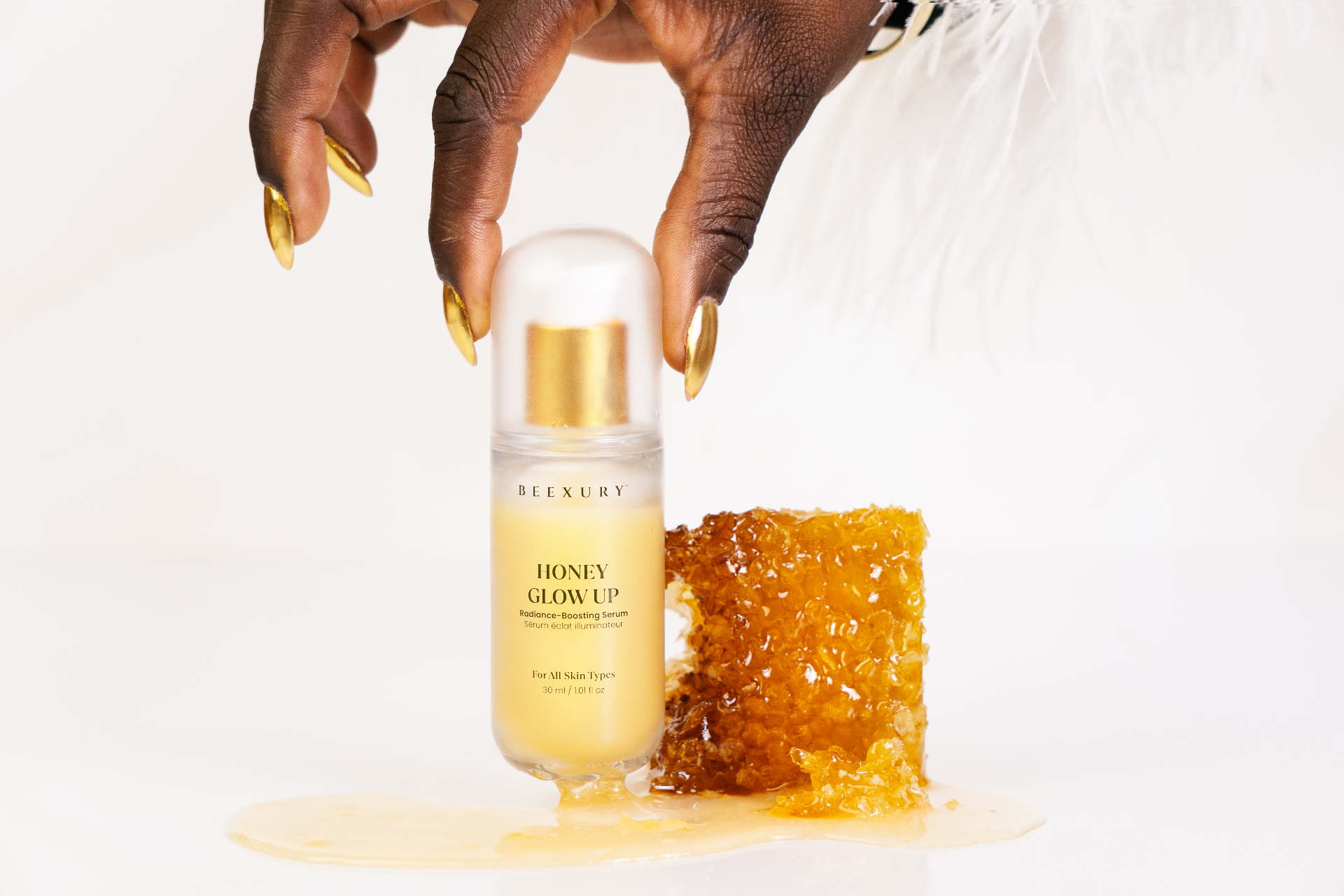 Honey Glow Up radiance-boosting serum bottle, still-life